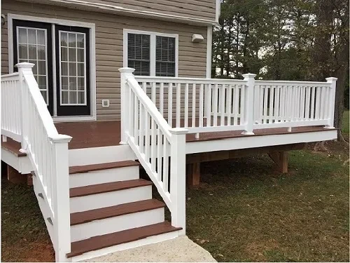 White deck with stairs and railing