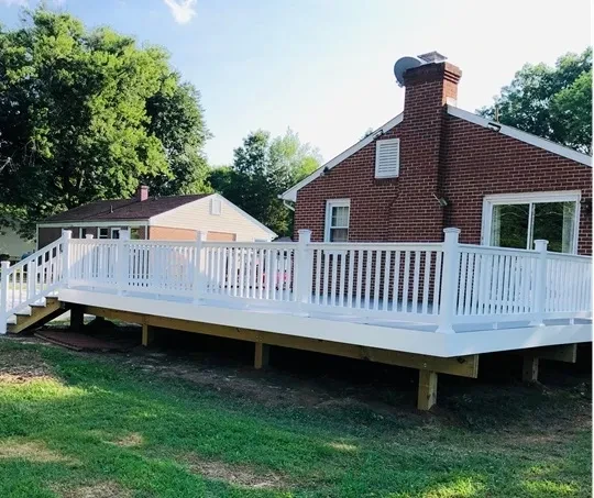 Brick house with white deck railing