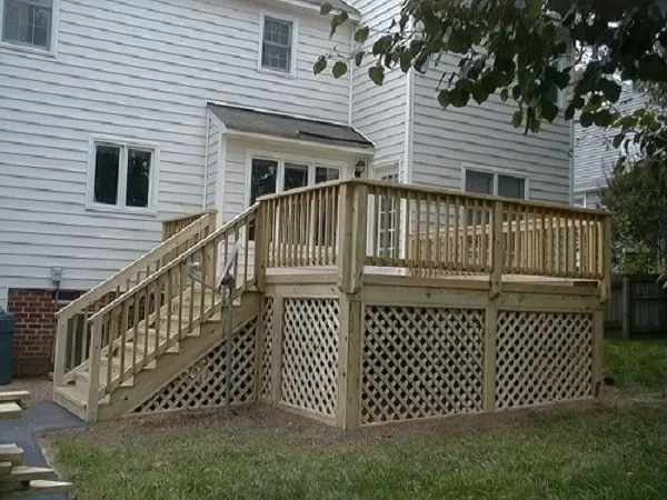 Wooden deck with railing and stairs