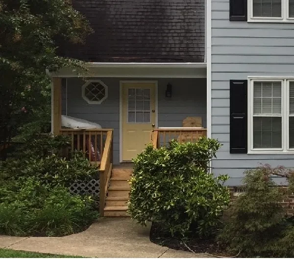 Residential house front porch with landscaping