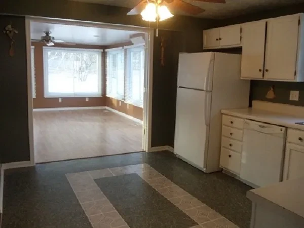 Kitchen with open floor plan to living room