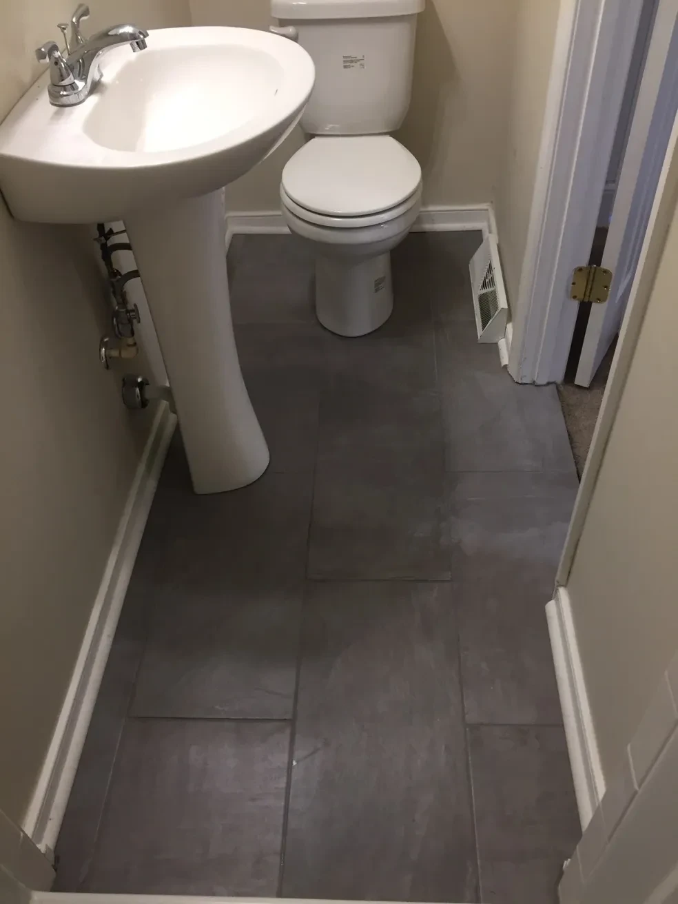 Small bathroom with toilet and sink