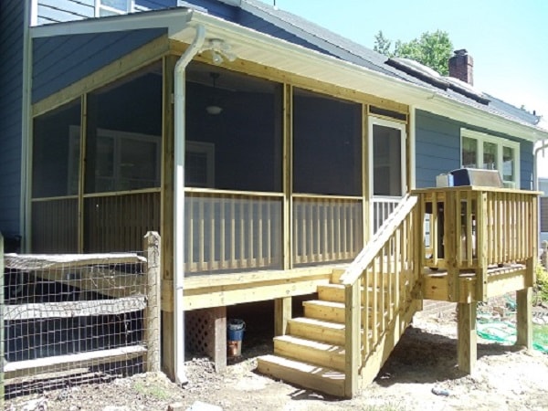 Wooden screened porch addition completed project