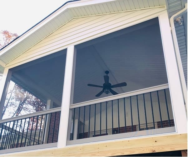 Screened-in porch backyard home exterior enclosure