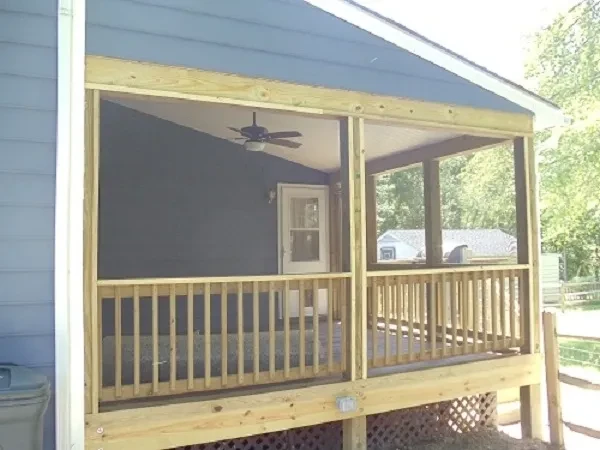 Wooden screened porch with ceiling fan