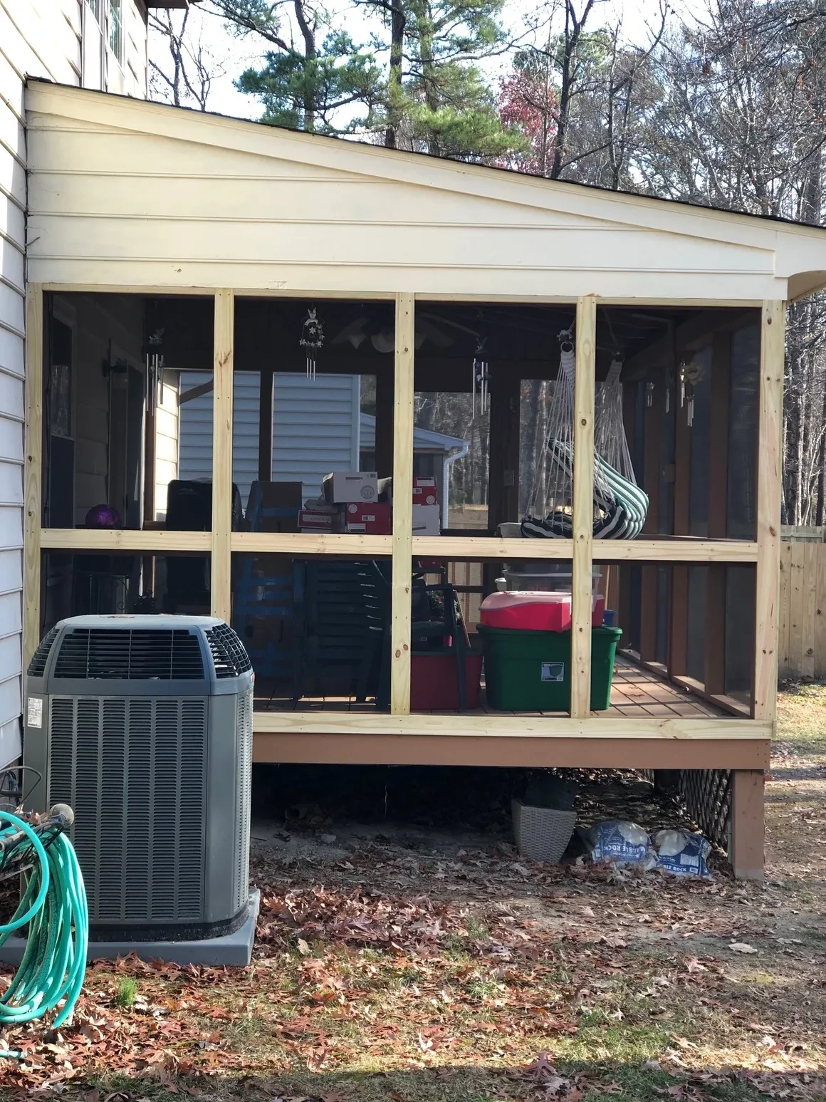 Screened porch with air conditioning unit