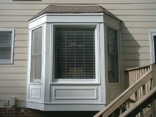 Bay window with white trim and blinds